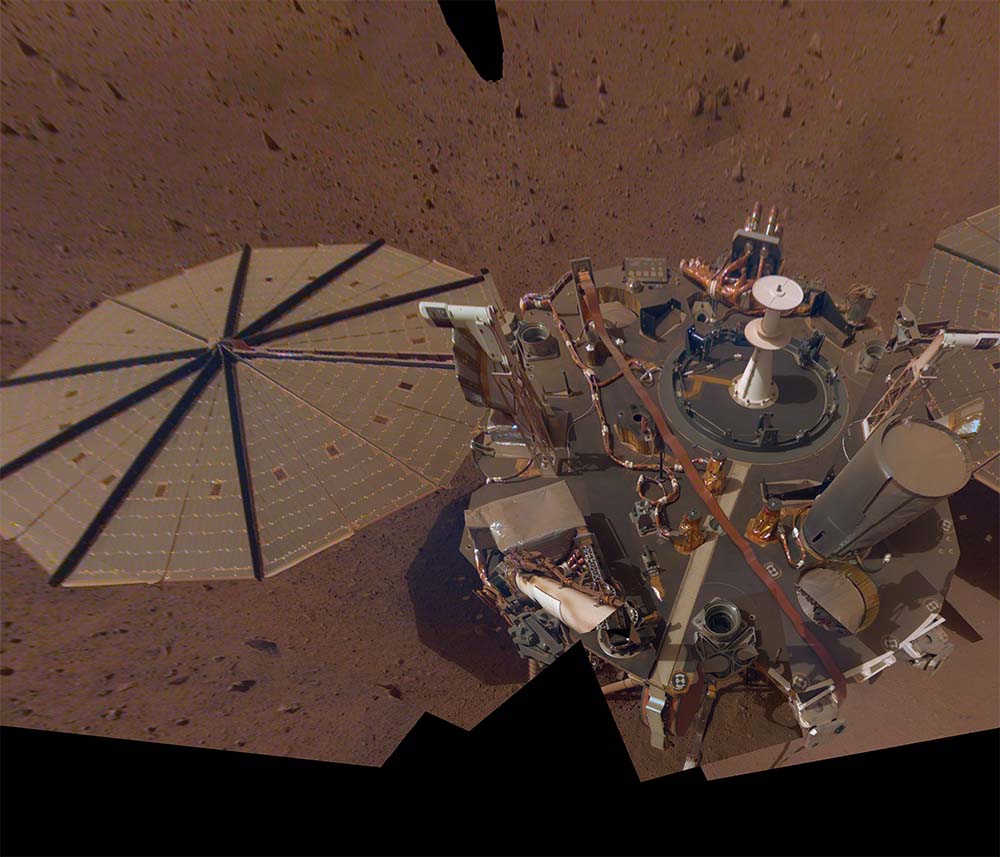 InSight's second selfie on Mars shows much dustier solar panels than before. This selfie is made up of 14 images taken between March 15 and April 11, 2019. | Source: NASA/JPL