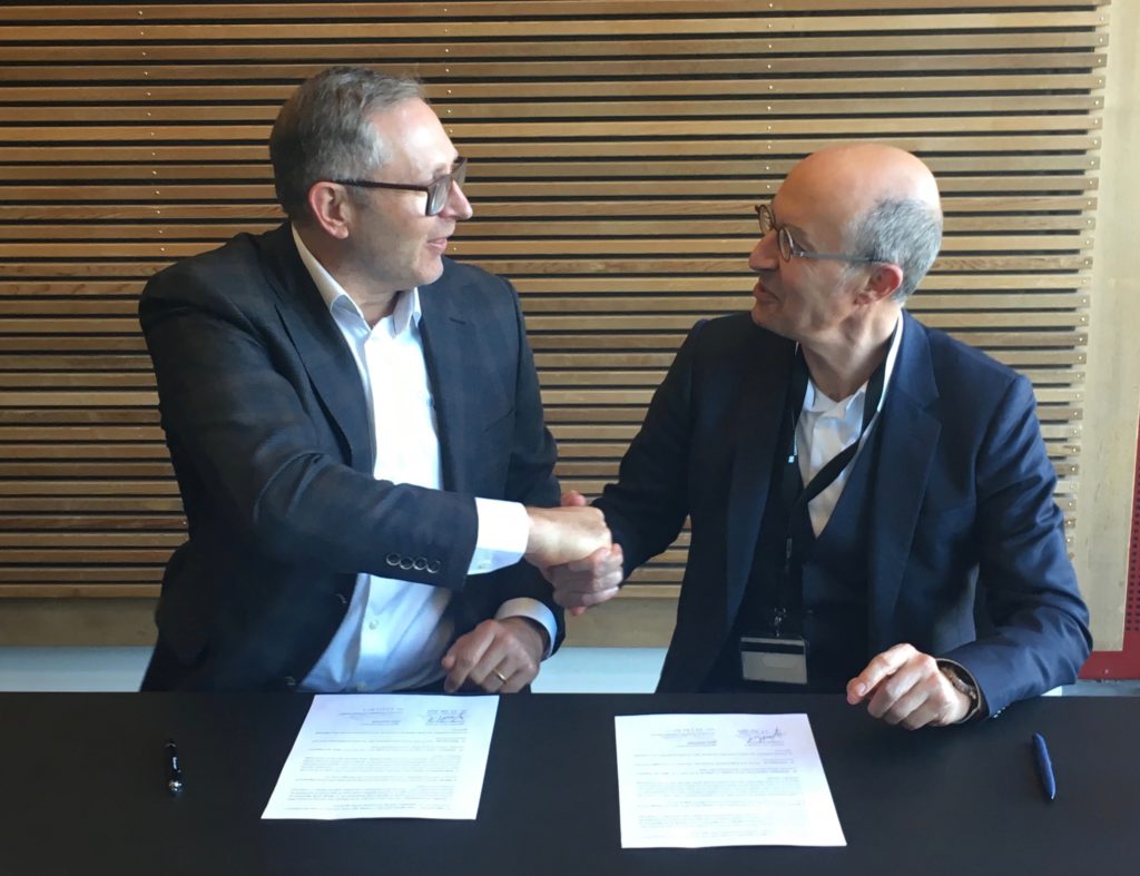 Universal Robots President Jürgen von Hollen and Sepro Group CEO Jean-Michel Renaudeau at agreement signing. 