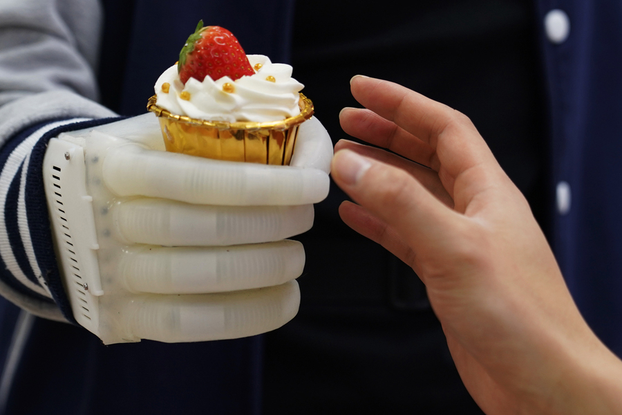 Inflatable robotic hand amputees real-time tactile