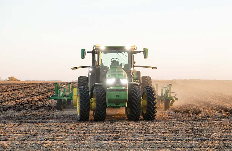 John Deere autonomous tractor in a field