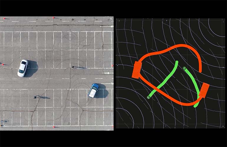 screen shot of Seoul Robotics Control Tower software showing cars in a parking lot next to a tracking screen.