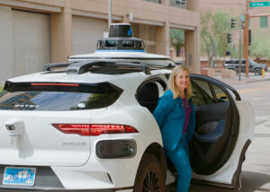 Mayor Kate Gallego getting out of a Waymo car