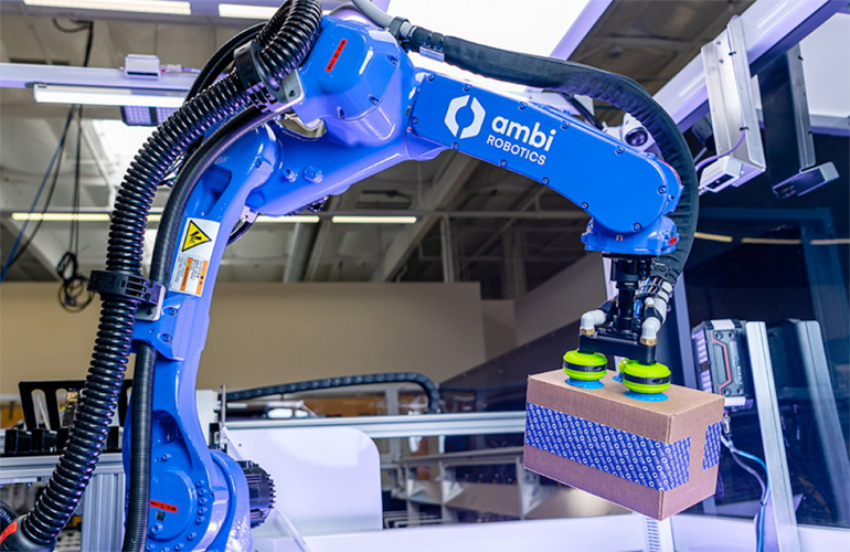 industrial robot picks an item for a customer order.