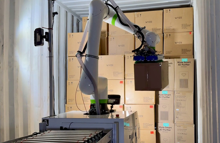 anyware robotics mobile manipulator unloads boxes from a shipping container.