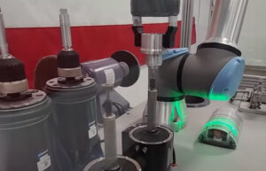 "The Finisher" is a plug-and-play workcell from Brinkman Automation with UR cobots.