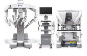 The Toumai endoscopic surgical system from MicroPort. The system is made up of three consoles, one with four surgical arms, one with a screen, and an image machine.