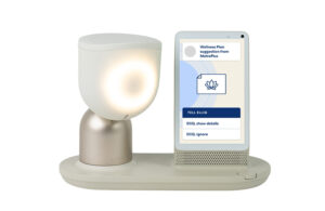 elliq robot sits next to user screen