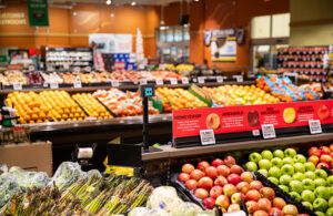Tally spot camera fixed above the fruit and vegitable secion of a grocery store.