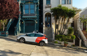 A Cruise vehicle picking up a rider in San Francisco.