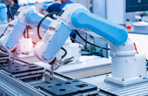 A robot arm working on an assembly line.