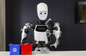 Apptronik's Apollo robot holding a metal item.