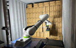 anyware robotics mobile manipulator unloads boxes from a shipping container.