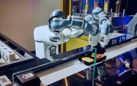 A dual-arm YuMi cobot puts the finishing touches on a BurgerBots meal.