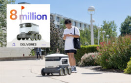 a student takes delivery from a starship robot