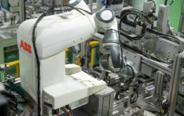ABB YuMi two-armed robot assisting with manufacturing.