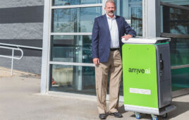 Arrive AI's founder and CEO Dan O'Toole with one of the company's smart mailboxes.