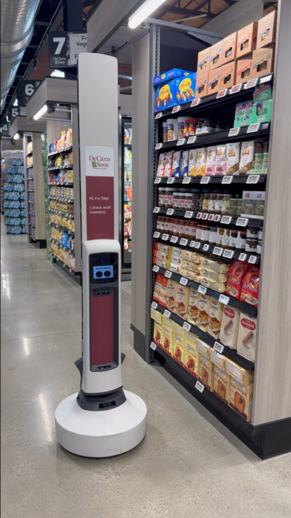 Tally with DeCicco & Sons branding scans grocery shelves.
