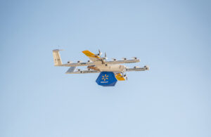 A Wing drone carrying a walmart package.