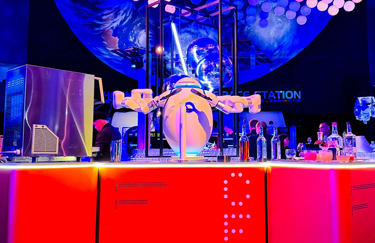 The ADAM robot from Richtech Robotics serves drinks at Kennedy Space Center.