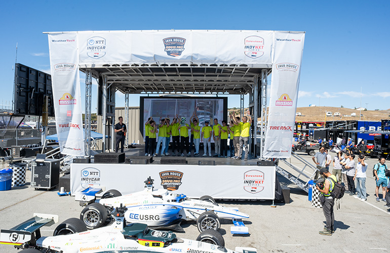 team polimove on the podium.
