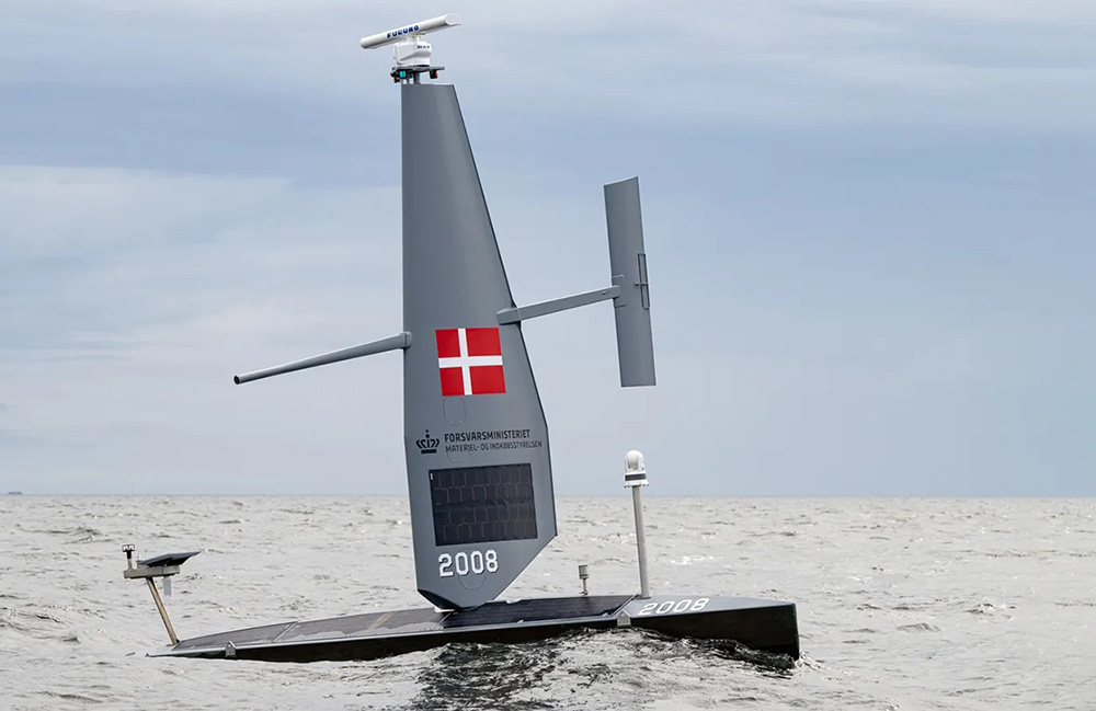 A Saildrone USV with the Denmark flag.