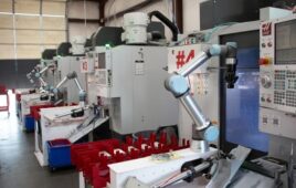 a fleet of UR cobot arms working in machine tending applications.