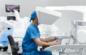 A surgeon using the Ronovo Surgical Carina system.