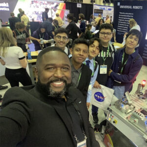 Ted Rozier with students at IMTS Smartforce Student Summit.