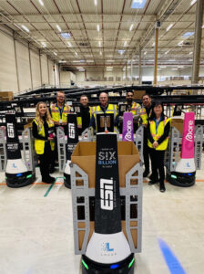 Locus Robotics executives celebratedthe company’s 6 billionth robot-assisted pick.