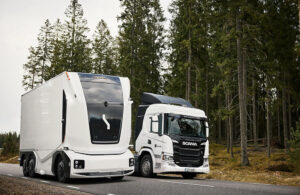 An Einride autonomous truck passing a semi.