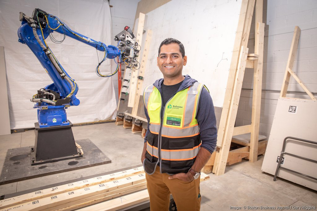 Vikas Enti with robotic arm.