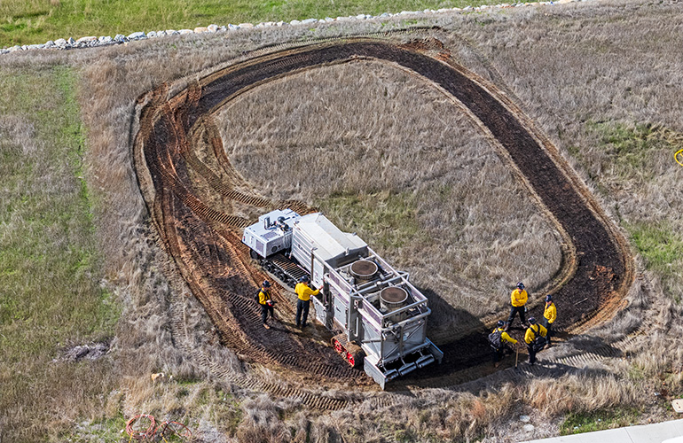 drone image showing overhead view of the oval burn scar left by the burnbot.