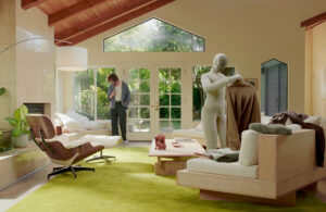 A NEO humanoid putting away laundry.