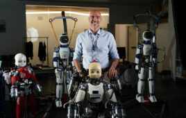 Daniele Pucci with four humanoid robots developed at IIT.