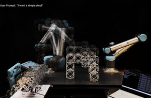 A robotic arm builds a lattice-like stool after hearing the prompt “I want a simple stool,” demonstrating how the system translates speech into real-time fabrication.