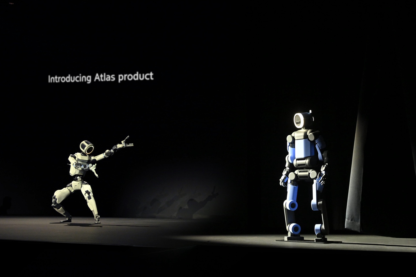 Atlas humanoids on stage at CES.