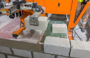 Buildroid demonstrates its BLR robot at a construction site.