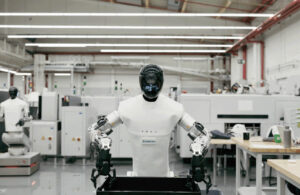 A mobile manipulator from Humanoid picking up a tote from a conveyor.