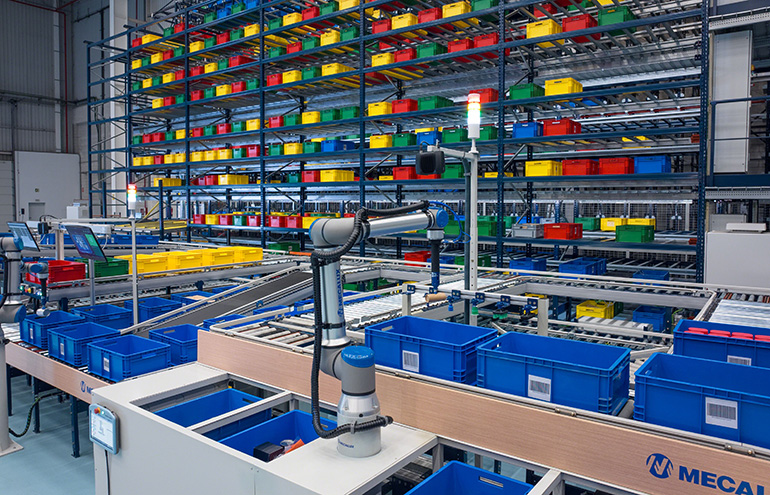 Siemens' SIMATIC Robot Pick AI, a pre-trained, deep learning-based vision software, uses Universal Robots to perform tasks previously limited to manual intervention. Here is the physical AI system in action for intralogistics technology company Mecalux.