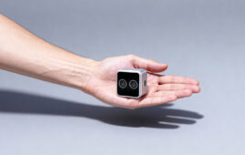 A hand holding the Gemini 305.