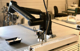 Kassow's cobot arm performing a dispensing tasks.