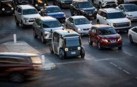 zoox robotaxi in traffic.