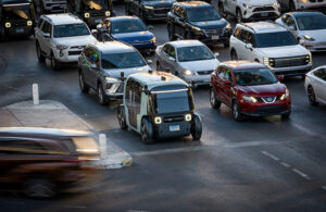 zoox robotaxi in traffic.