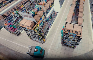 tennant floor cleaner moving through a store aisle.
