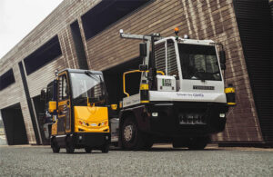 Oxa’s systems tow and carry goods in ports, airports, or manufacturing facilities, as well as monitor assets and perimeters in solar farms or industrial plants.
