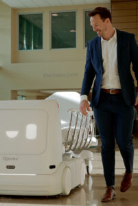 David Crabb, M.D., founder and chief executive officer of Rovex, with the company’s robotic transport system at BayCare’s Morton Plant Hospital in Clearwater, Florida.