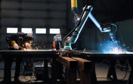 The UR8 robot welding.