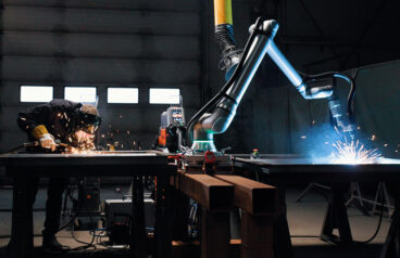 The UR8 robot welding.