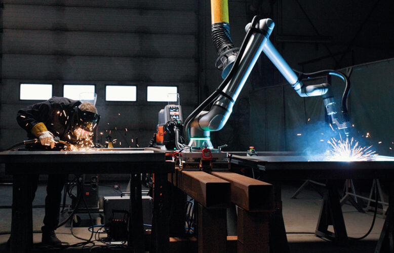 The UR8 robot welding.