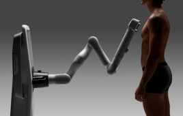 robot inspects skin of a male patient.